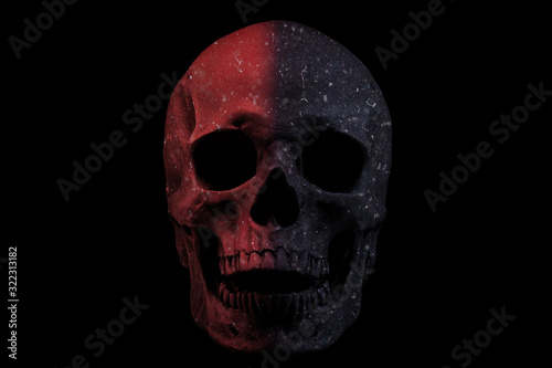 Half red skull isolated on black background. 