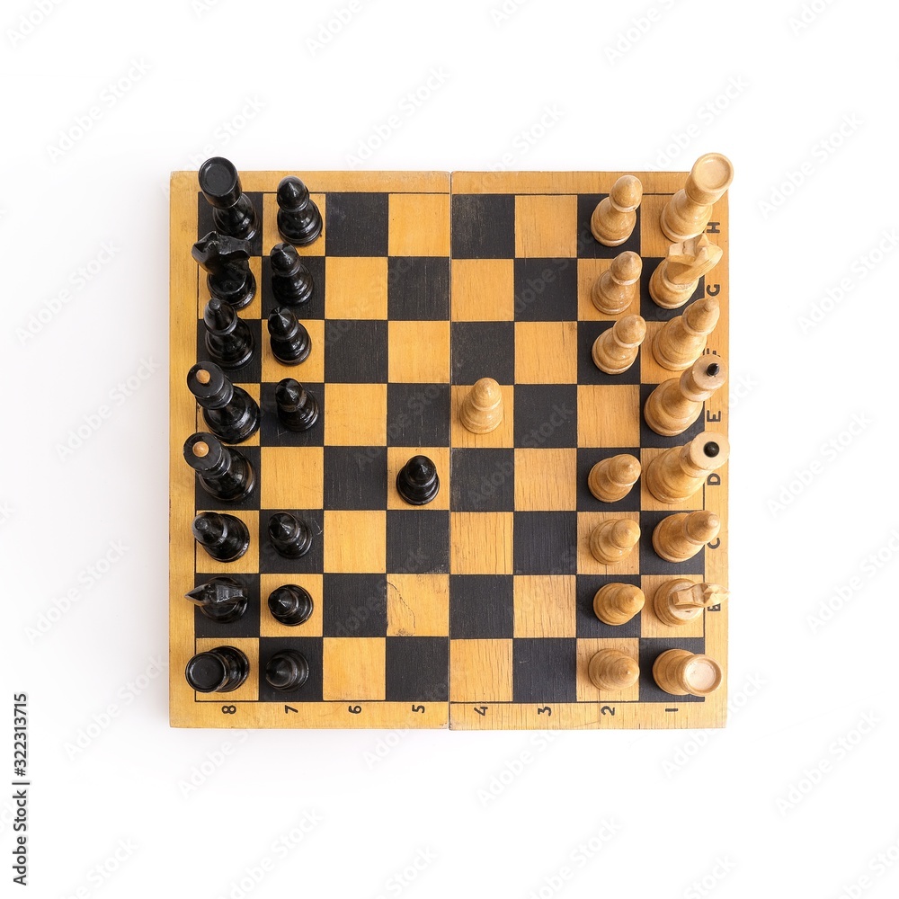 Chess on a wooden board on a white background Chess on a wooden board on a white background