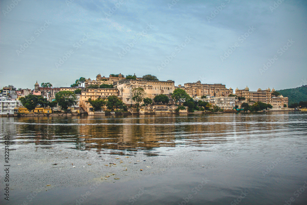 Udaipur, Rajasthan / India »; August 2016: The royal palace from the lake of the city of Udaipur