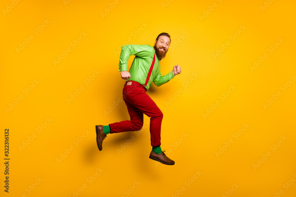 Full size photo of cheerful irish man jump run after discount wear good look clothing suspendsers trousers shoes isolated over bright color background