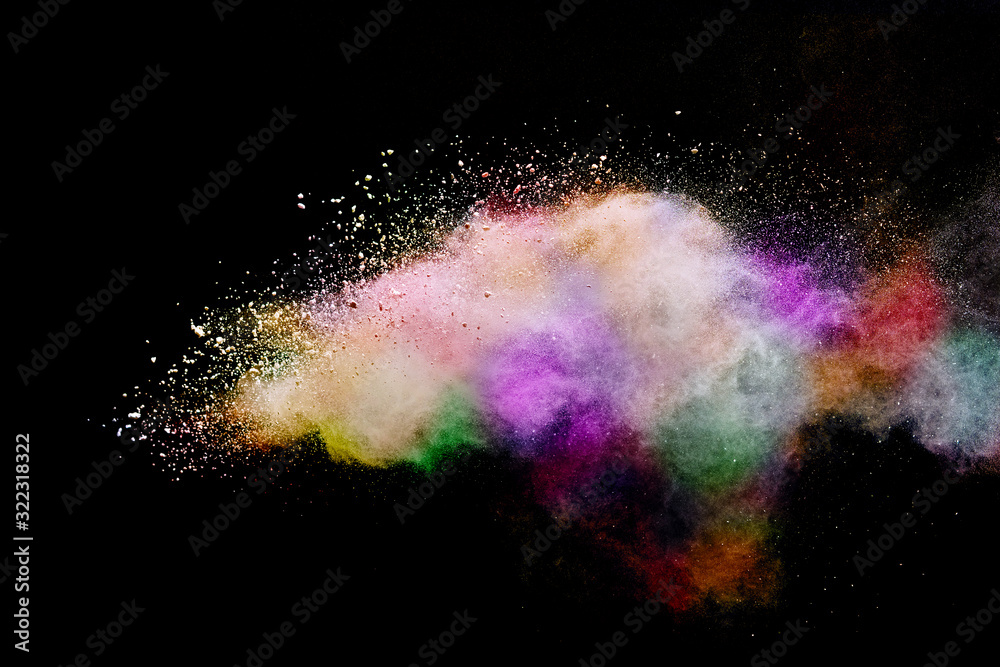 Fototapeta Abstract powder splatted background. Colorful powder explosion on black background. Colored cloud. Colorful dust explode. Paint Holi.