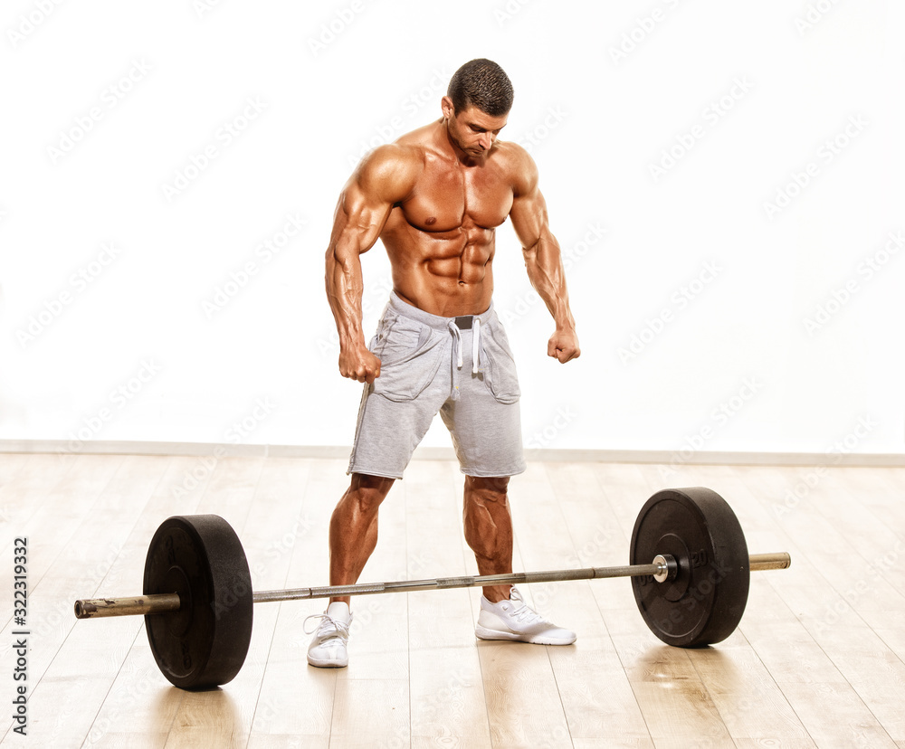 Fototapeta premium Muscular Men, Bodybuilder Preparing To Lift Heavy Weights, Barbell
