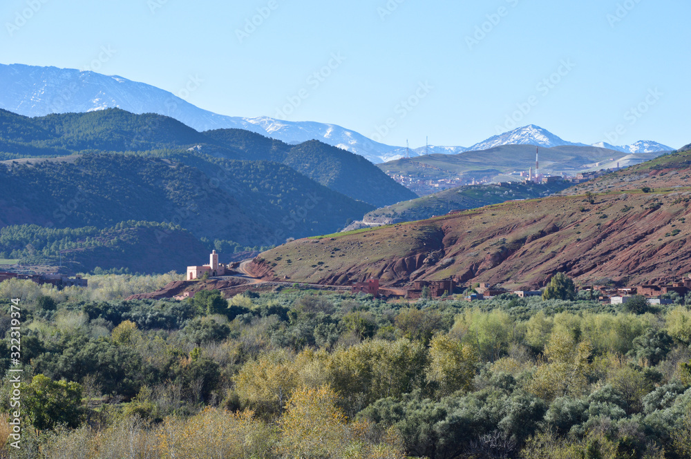 Berber villages and houses made out of clay at the hills and mountains of High Atlas 