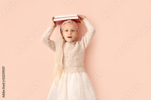 Surprised little girl with ...
