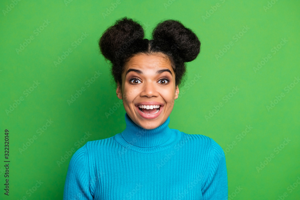 Closeup photo of funny beautiful pretty dark skin lady excited good mood beaming smile crazy facial expression wear blue turtleneck sweater isolated green color background Closeup photo of funny beautiful pretty dark skin lady excited good mood beaming smile crazy facial expression wear blue turtleneck sweater isolated green color background