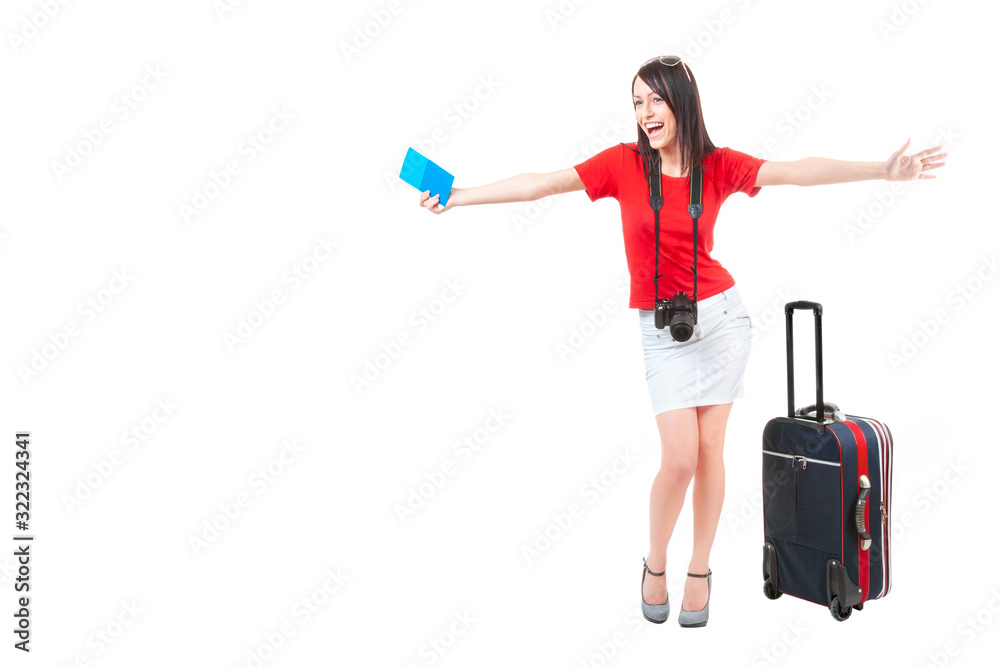 A beautiful young woman in a red blouse and white skirt, with a ticket in her hands, a camera and a small travel suitcase, joyfully spread her arms for a hug when meeting a loved one, isolated. A beautiful young woman in a red blouse and white skirt, with a ticket in her hands, a camera and a small travel suitcase, joyfully spread her arms for a hug when meeting a loved one, isolated.