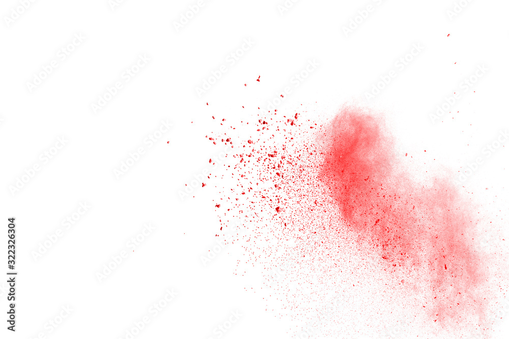 Red powder explosion on white background. Colored cloud. Colorful dust explode