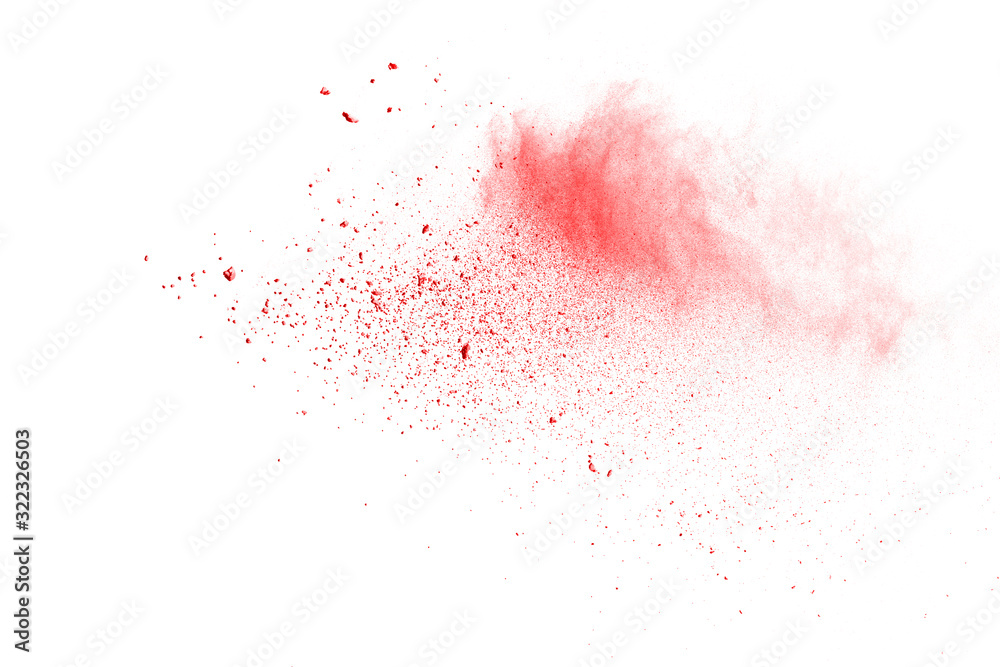 Red powder explosion on white background. Colored cloud. Colorful dust explode