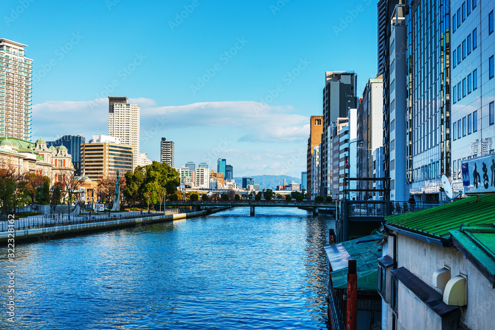 Obraz premium OSAKA, JAPAN - January 14, 2020: Modern office building in Osaka, Japan