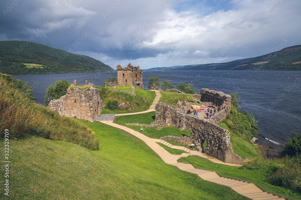 The summer view of ruins of the Urquhart Castle and Loch Ness