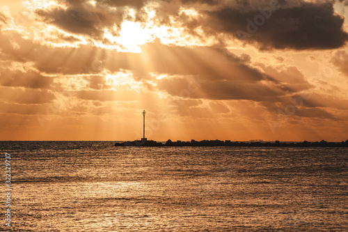 sun rays over the sea