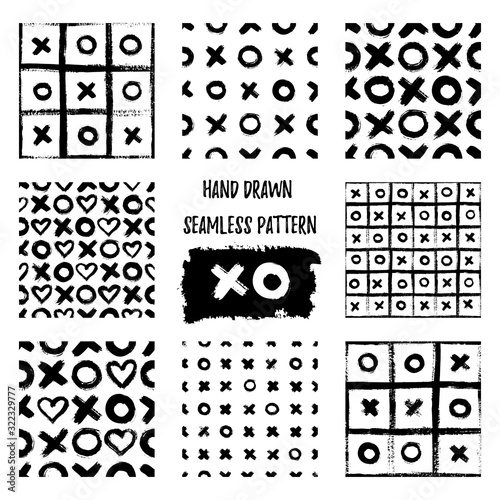 Set of XOXO seamless patterns. Vector Abstract backgrounds with ink brush strokes. Monochrome Scandinavian hand drawn print. Grunge texture with simbols of zero, cross and heart.