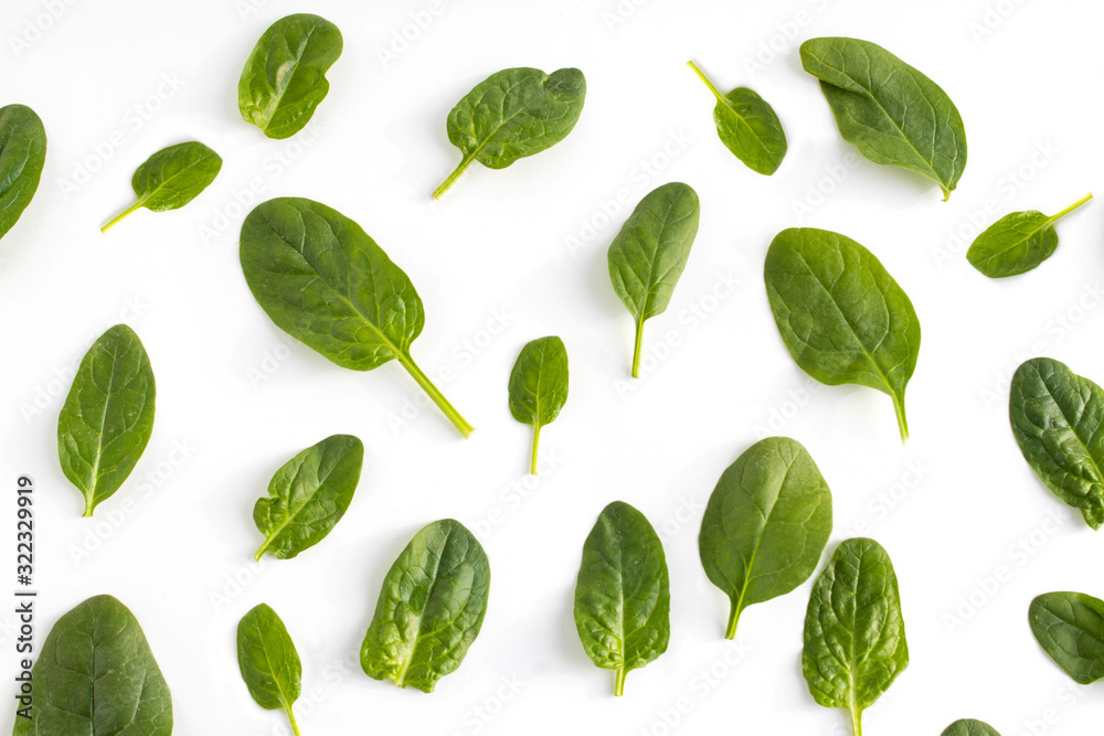 Spinach pattern background on white. Top view Spinach pattern background on white. Top view