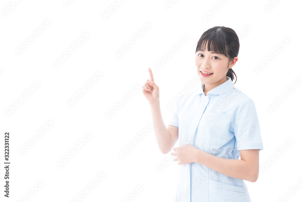 指をさす若い看護師