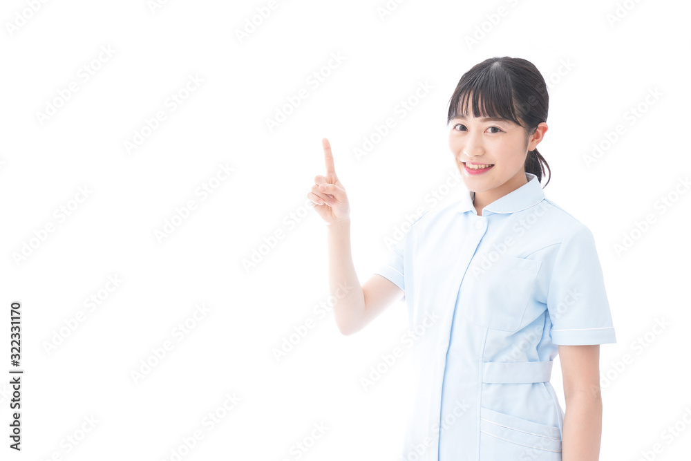 指をさす若い看護師