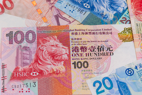 Hong Kong Currency 100, 20 and HSBC Bank Emblem in Hong Kong  © Savvapanf Photo ©