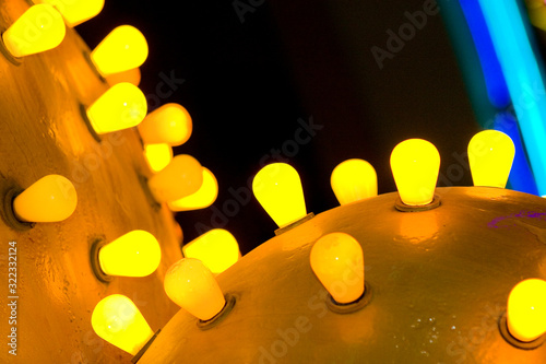 Photography Close-up of yellow lights in a sign