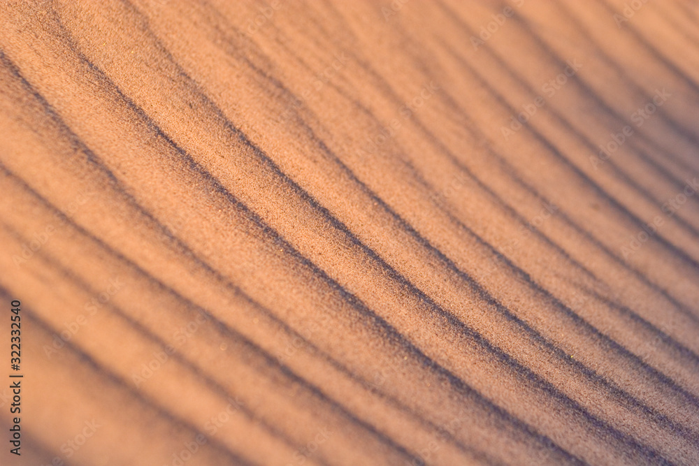 Close up background of waves in sand pattern Close up background of waves in sand pattern