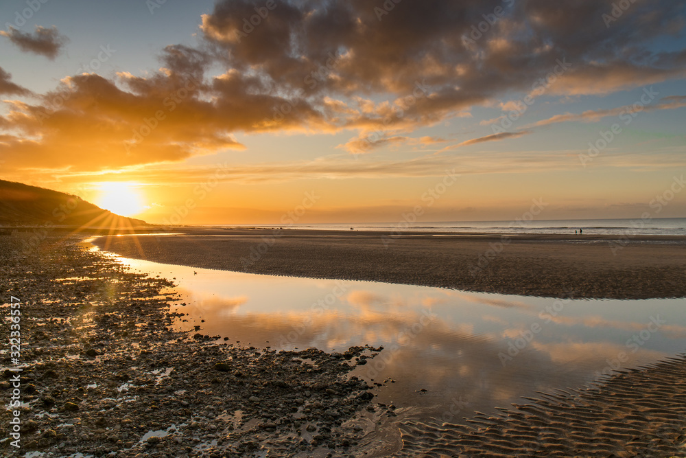 Villers-sur-mer, Normandy, France - Sunset at low tide Villers-sur-mer, Normandy, France - Sunset at low tide