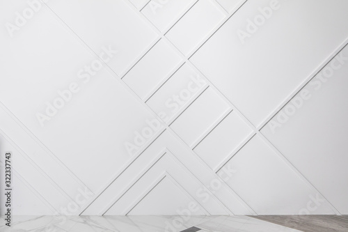 Minimalistic Modern Interior. Part of Room - Floor and Wall Decorated With Moldings. Background with Free Copyspace