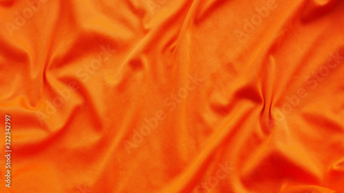 orange fabric background. colorful cotton cloth texture