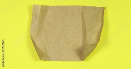 Stop Motion Animation Kraft Paper Unfolded Sheet Concept of Ecology and Environmental Protection.