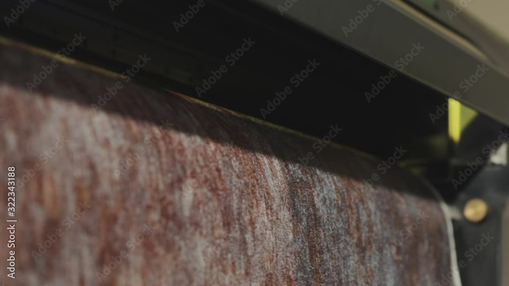 Modern wallpaper factory. Industrial printer making new wallpaper