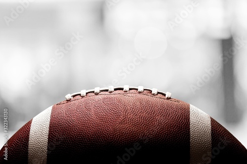 American football ball on blur background