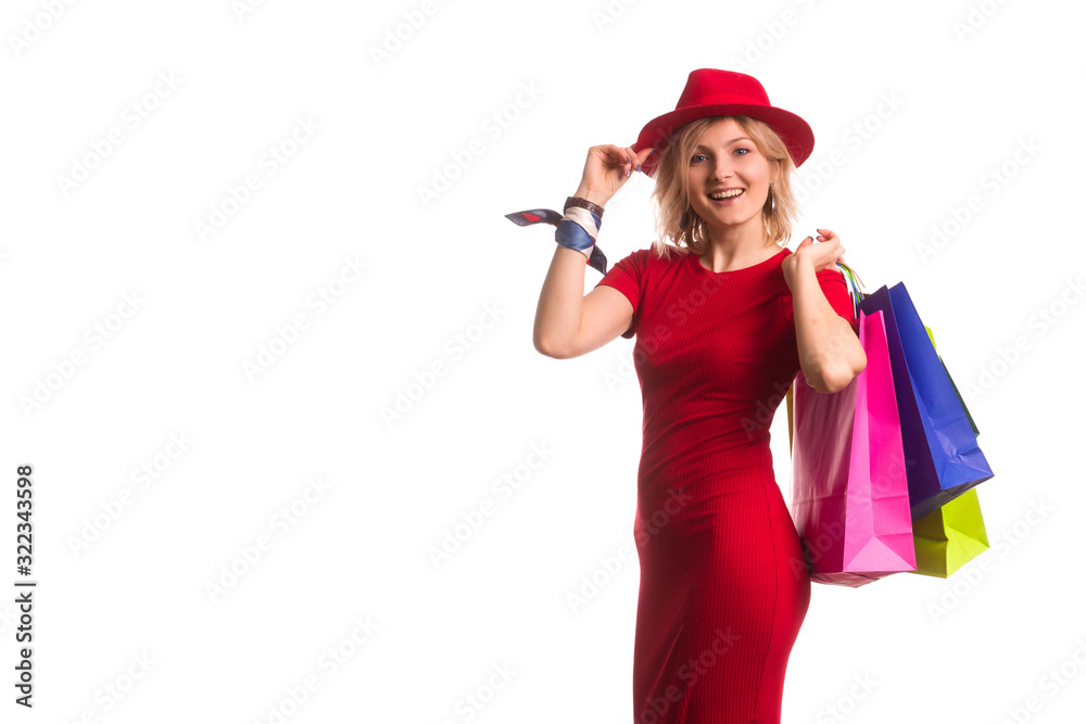 blonde girl in a red dress with Shopping Bags. Sales blonde girl in a red dress with Shopping Bags. Sales