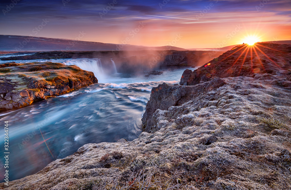 Incredible frosty morning and sunrise at the most famous place of Golden Ring Of Iceland. Godafoss waterfall near Akureyri in the Icelandic highlands, Europe. Popular tourist attraction. Postcard. - obrazy, fototapety, plakaty 