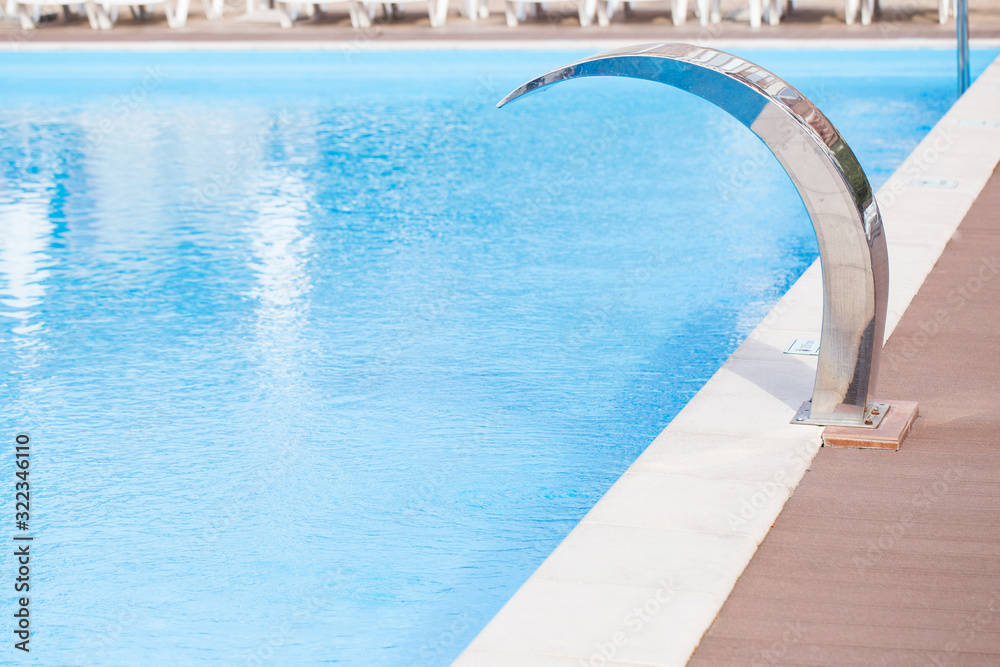 Water massage at the summer pool close-up.