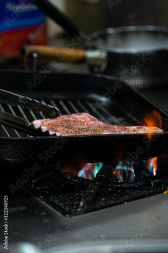 Grilled pork chop .Steak on a frying pan