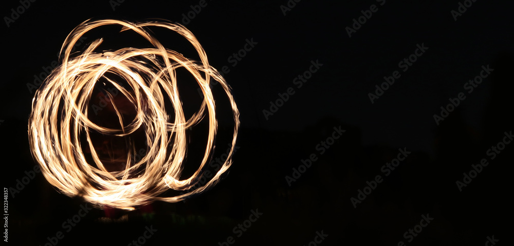 Fire show and a lot of the bright sparks in the night Fire show and a lot of the bright sparks in the night