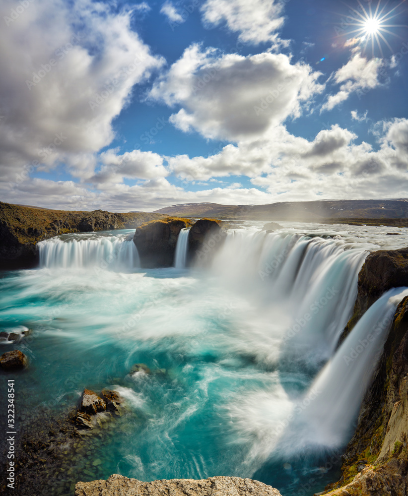 Panorama of most famous place of Golden Ring Of Iceland. Godafoss waterfall near Akureyri in the Icelandic highlands, Europe. Popular tourist attraction. Travelling concept background. Postcard. Panorama of most famous place of Golden Ring Of Iceland. Godafoss waterfall near Akureyri in the Icelandic highlands, Europe. Popular tourist attraction. Travelling concept background. Postcard.