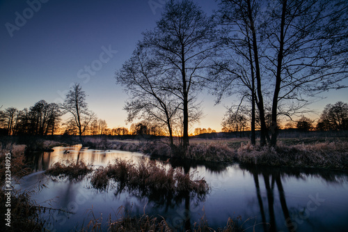 Blue hour sky above the river  © damian1400