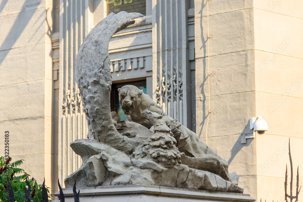 Statue of fight a lioness with eagle near House with Chimaeras in Kiev, Ukraine