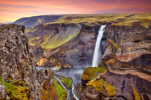 Amazing panoramic view of Haifoss waterfall on the Fossa river near the volcano Hekla  the second highest waterfall in Iceland  122 meters high  Scandinavia  Europe. Travel concept background..