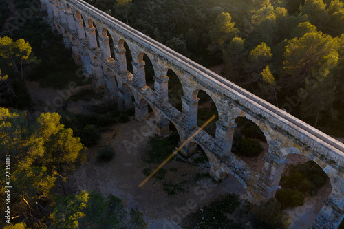Ancient bridge aqueduct. Aerial view.