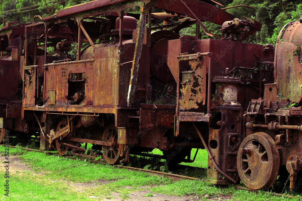 Rusty abandoned train. Vintage background.