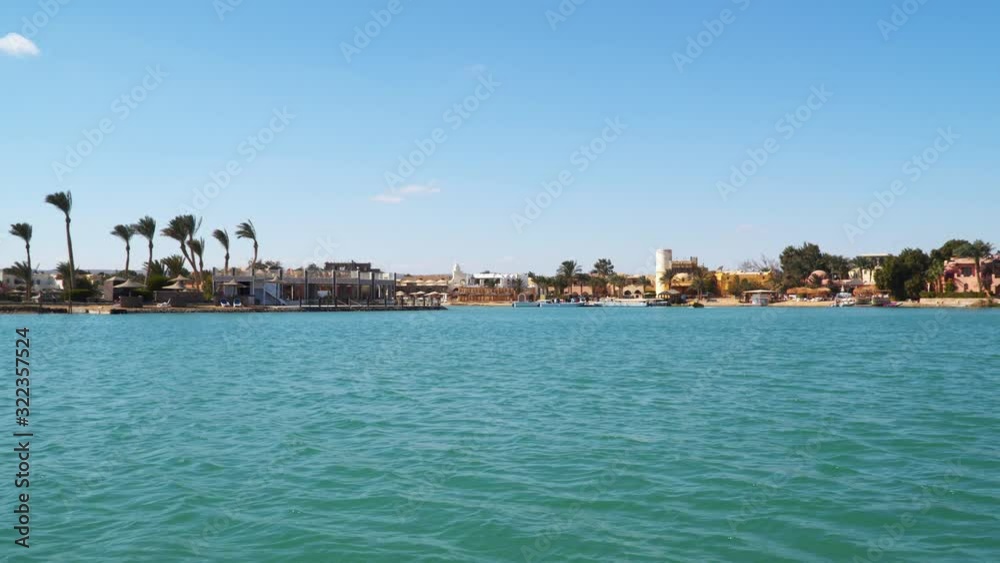 El Gouna is an Egyptian tourist resor . It is located on the Red Sea in the Red Sea Governorate of Egypt. View from a floating ship El Gouna is an Egyptian tourist resor . It is located on the Red Sea in the Red Sea Governorate of Egypt. View from a floating ship