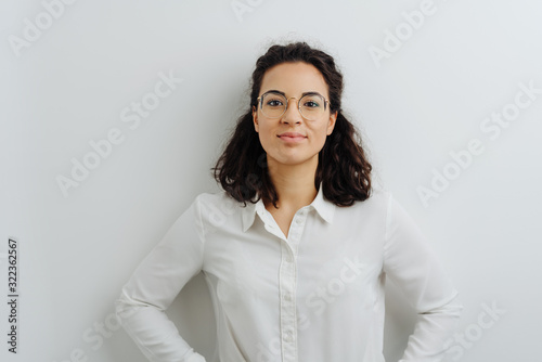 Relaxed confident young woman with friendly smile