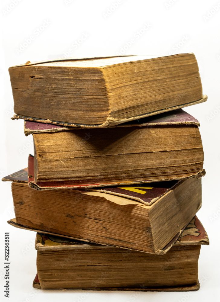 Fototapeta premium Antique old books isolated on white background. Selective focus