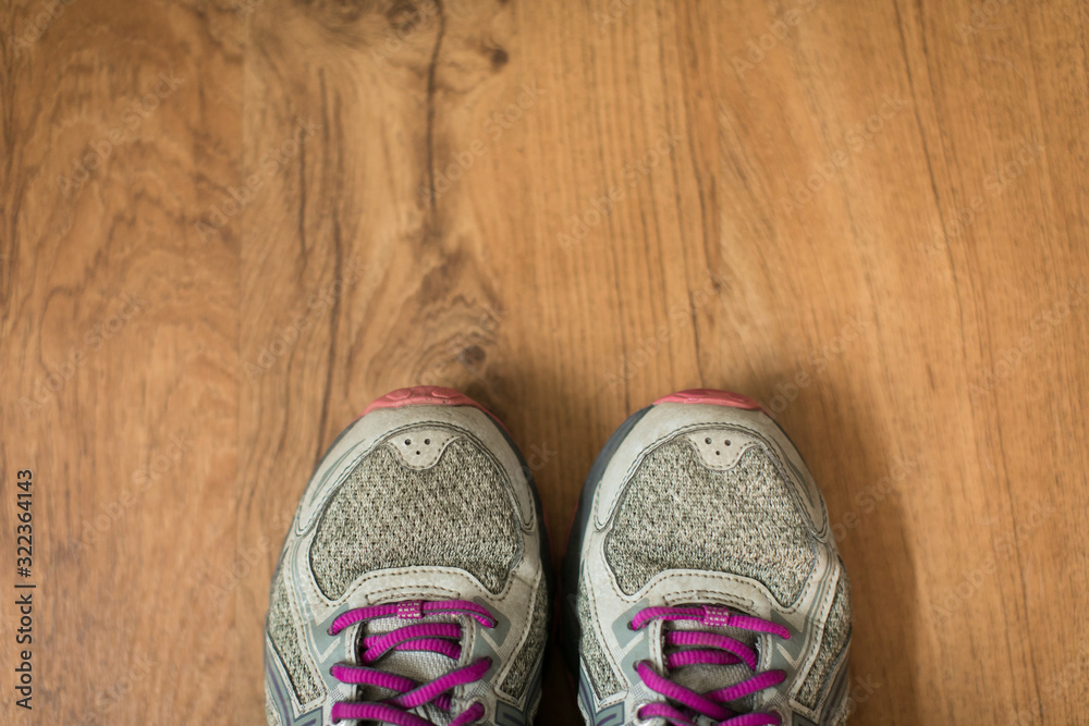 Looking down at running shoes