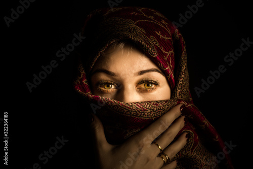 Bilde på lerret Portrait of a woman on a black background