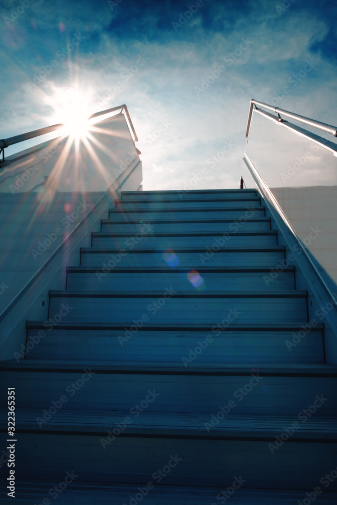 Fototapeta premium stairs up, ladder to the ship or plane. sky