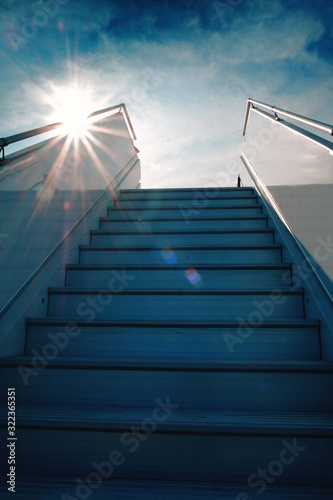 stairs up, ladder to the ship or plane. sky