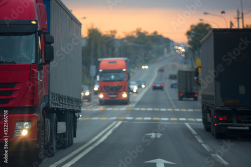 Truck transportation on the road at sunset