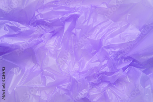 Close up Texture of a purple Plastic garbage Bag. Polyethylene F