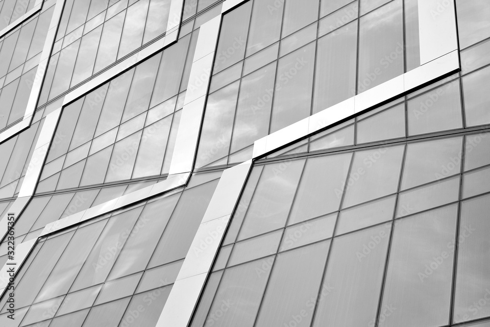 Abstract modern architecture with high contrast black and white tone. Architecture of geometry at glass window - monochrome. Abstract modern architecture with high contrast black and white tone. Architecture of geometry at glass window - monochrome.