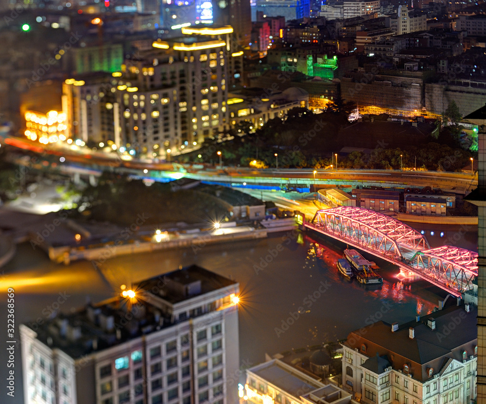 Bird view of illuminated Shanghai by night.